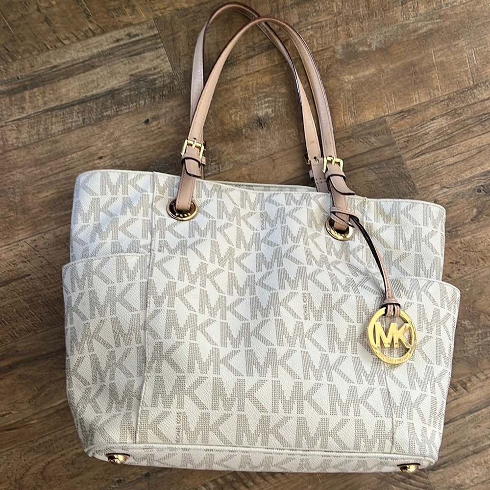 Michael Kors bag! It has some wearing on the handles